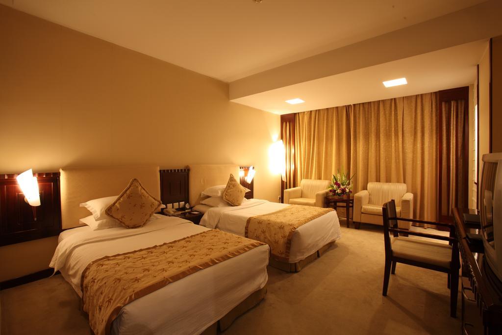 Beijing Wuhuan Hotel Pokoj fotografie