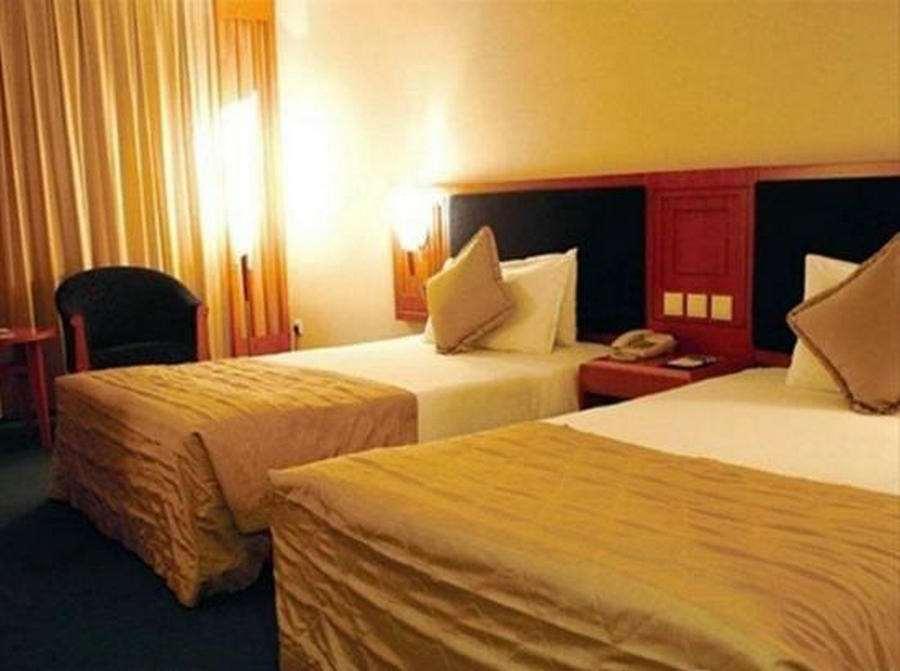 Beijing Wuhuan Hotel Pokoj fotografie