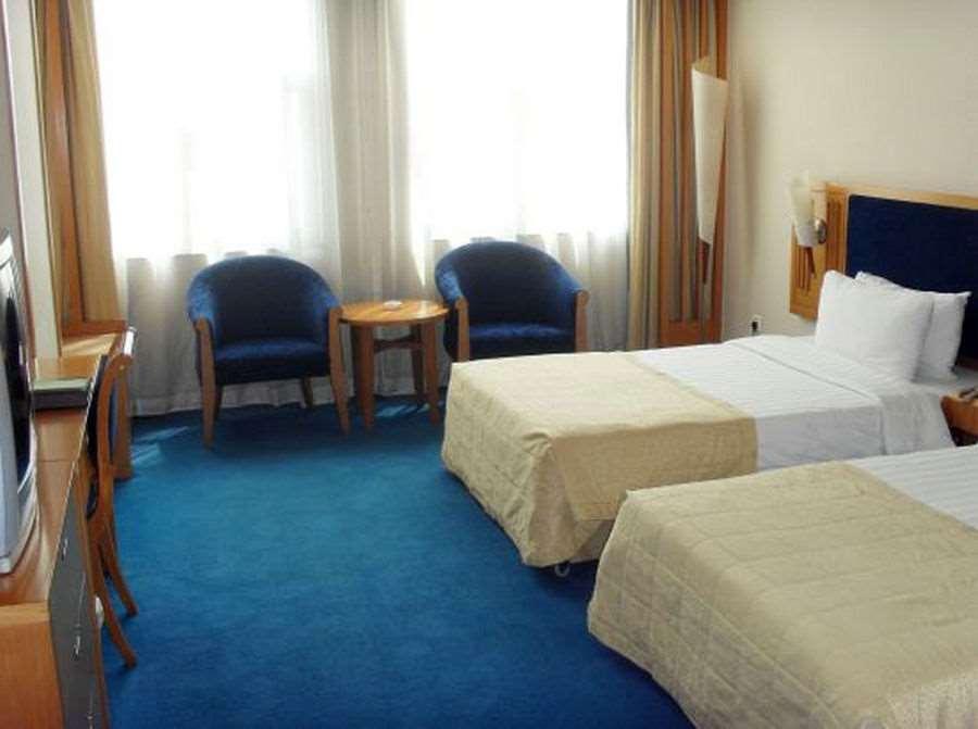 Beijing Wuhuan Hotel Pokoj fotografie